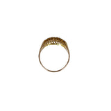 Gold ring with a diamond-like center on a white background