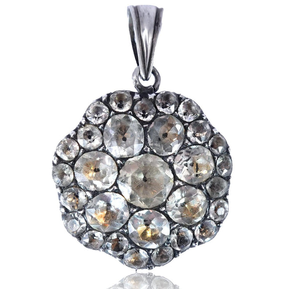 Clear stone pendant on white background
