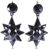 Black star-shaped earrings on a white background