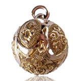 Gold pendant on a white background