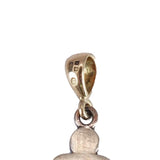 Gold pendant on a white background