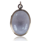 Silver pendant with a blue-green stone on a white background
