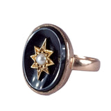 Ring with star design on a white background