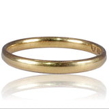 Gold ring on a white background