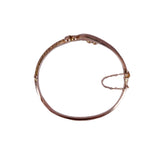 Rose gold bracelet on a white background