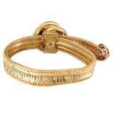 Gold bracelet with a clasp on a white background