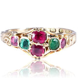 Gold ring with red and green gemstones on a white background