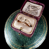 Vintage ring in a jewelry box on a green cushion