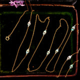 Edwardian 18k Gold Opal and Rock Crystal Long Chain circa 1910