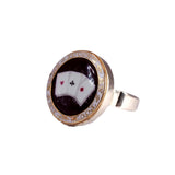 Ring with a poker-themed design on a white background