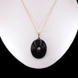 Victorian 14k Gold, Onyx and Rose Cut Diamond Pendant circa 1880